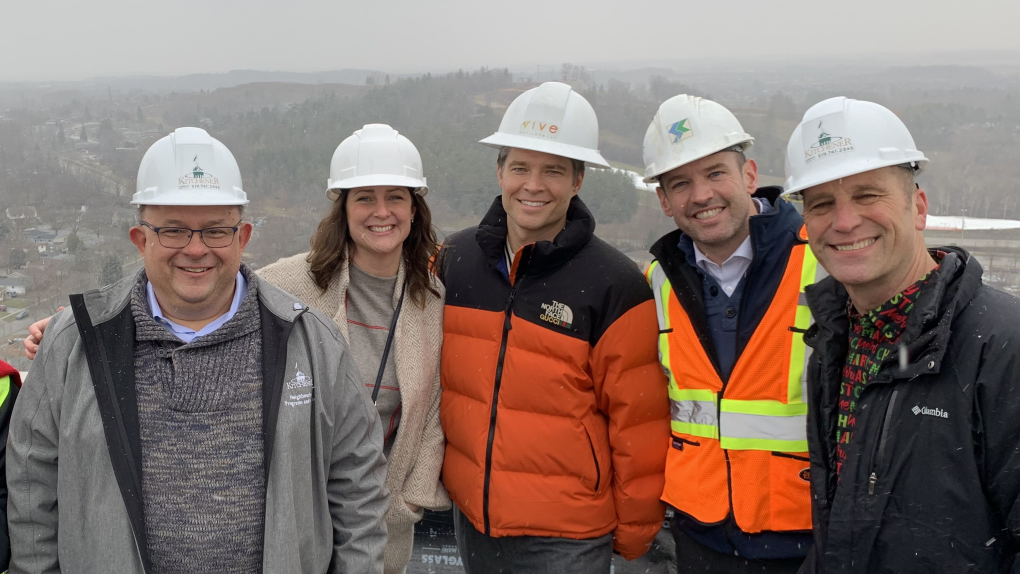 Kitchener Mayor Berry Vrbanovic, Kitchener councillor Stephanie Stretch, Vive Developments Chief Development Officer Stephen Litt, St. Catharines Mayor Mat Siscoe and Kitchener councillor Dave Schnider posed for a photo on Dec. 18, 2024. (Jeff Pickel/CTV News)